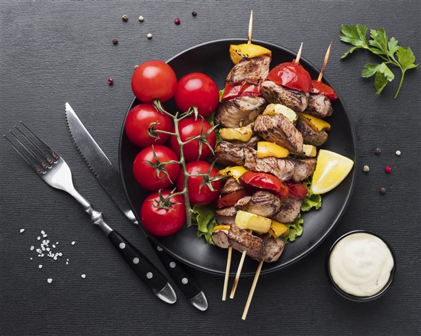 top-view-plate-with-delicious-kebab-tomatoes.jpg