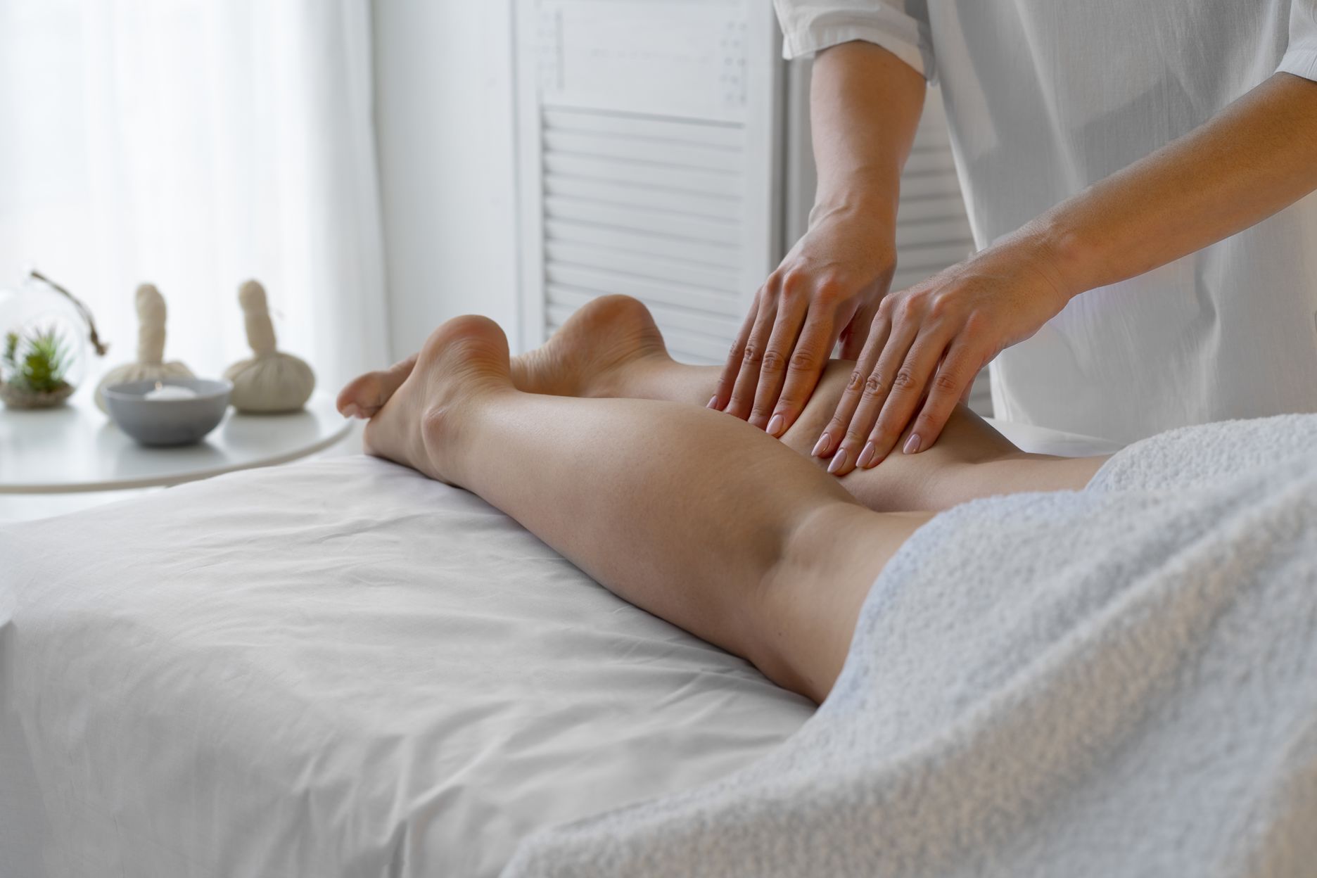 woman-spending-time-at-the-spa-and-getting-a-relaxing-massage (1).jpg
